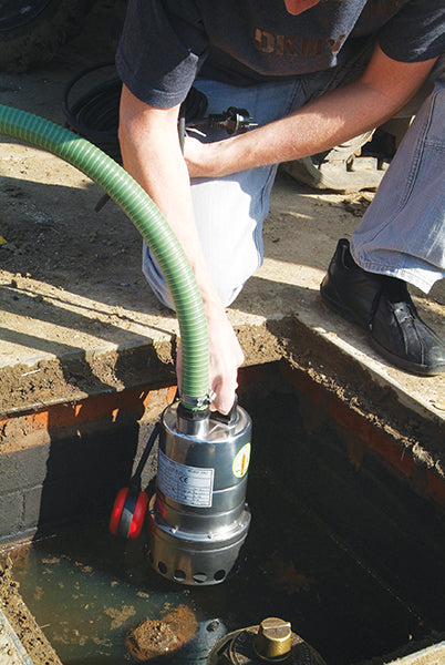 Mizar Submersible Dirty Water Pumps - location shot, pump being placed in water with hose attached for water extraction