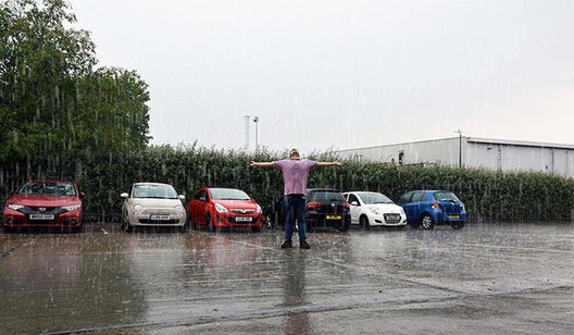 Louis our Warehouseman enjoying the much needed rain