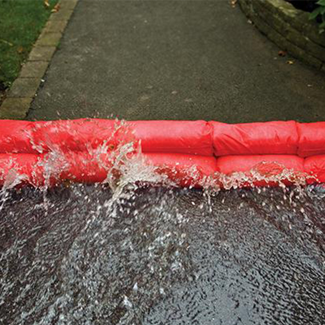 HYDROSNAKE Flooding Accessory - location shot, HYDROSNAKE blocking path from flood water